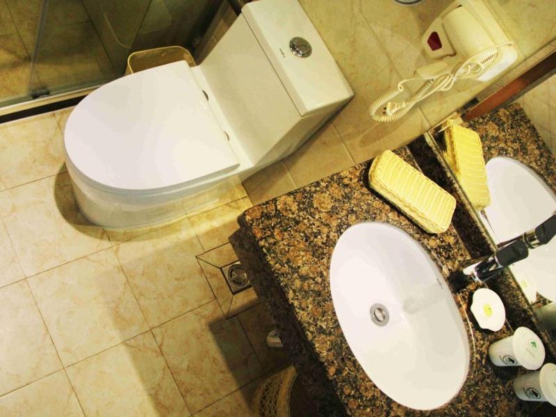 فندق جرين تري إن إكسبريس شاندونج كينجداو ديفيلوبمنت ديستريكت داست تشينغداو المظهر الخارجي الصورة